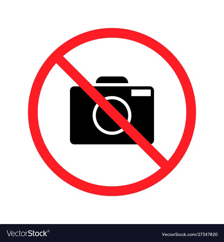 a no photo allowed sign with a camera in the red circle on a white background