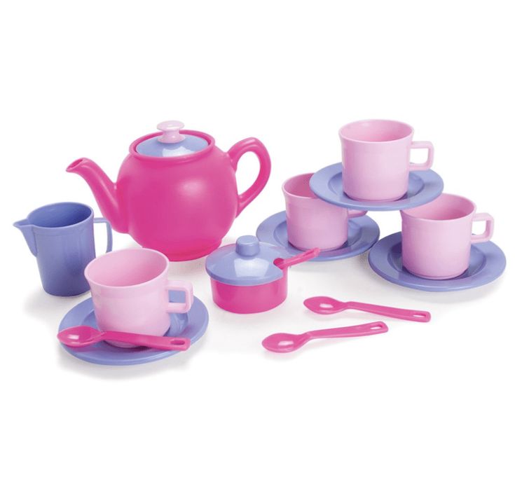 a pink tea set with purple cups and saucers