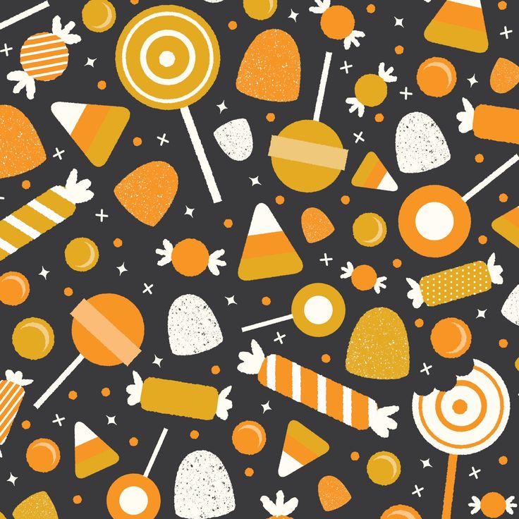 an orange and white candy pattern on a black background