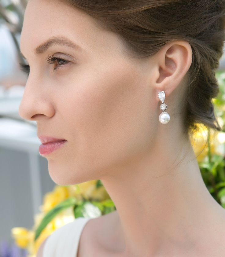 bridal earrings, stud earrings, pearl earrings, wedding earrings, bridal jewelry, rose gold earrings, wedding accessories ► Spend $200 | Receive 10% OFF Your Order with Code: 10OFF200 ► Please note in your order when your wedding date is MATERIALS & MEASUREMENTS - 18K White Gold, Gold Rose Gold over brass - Cubic Zirconia Crystals - Freshwater Pearls - Hypoallergenic, Lead & nickel free - Height 1.25 in | 3.2 cm x Width 0.4 in | 1 cm ► SHOP ROSE GOLD BRIDAL EARRINGS COLLECTION https://ww Elegant White Diamond Earrings For Wedding, Elegant Diamond Earrings With Pearl Drop For Wedding, Delicate Diamond Drop Earrings For Wedding, Elegant Wedding Diamond Earrings For Pierced Ears, Elegant Wedding Diamond Earrings, Classic Rose Gold Bridal Earrings For Wedding, Delicate Dangle Earrings For Mother Of The Bride, Graceful Wedding Earrings For Pierced Ears, Delicate Diamond Earrings For Wedding