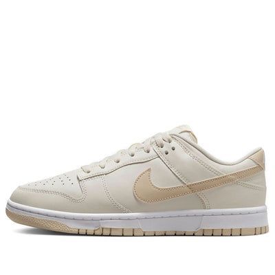 The Nike Dunk Low 'Light Bone Tan' is a stylish sneaker crafted from full-grain leather with a mesh tongue and lining. The Light Bone base is complemented by tan Swooshes, heel, tongue branding, insoles and rubber outsole. The white midsole and heel feature a white “NIKE” embroidered branding. This sneaker is perfect for everyday wear and is inspired by the classic Dunk series. The tan colorway adds a subtle touch of style to any outfit. With its timeless design, the Nike Dunk Low 'Light Bone Tan' is sure to be a hit. Cream Leather Sneakers For Streetwear, Urban Cream Sneakers For Streetwear, Nike Beige High-top Sporty Sneakers, Nike Urban Sneakers With Gum Sole, Nike Sneakers With Rubber Sole, Nike Sporty Custom Sneakers In Beige, Beige Nike Sneakers With Rubber Sole, Nike Beige Custom Sporty Sneakers, Nike Beige Sneakers For Sports