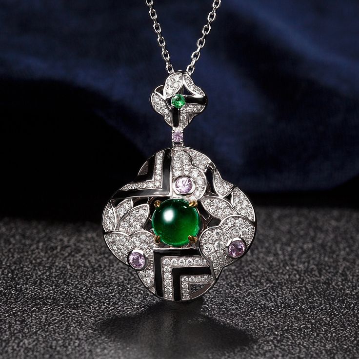 "Details * Handmade item * Material: 14K Solid White Gold .💯Center Stone： 1.59ct Natural emerald； .🎉Side stones 1 ：0.68ct Diamond .🎉Side stones 2 ：0.035ct Tsavorite .🎉Side stones 3 ：0.287ct Pink Sapphire I T ' S ∙ E X Q U I S I T E    * All personalization is done BY HAND. After calcination, dissolution, recombination, carving and grinding         of the complex process * Handcrafted with care and love by happy hands in my studio. * Each jewelry comes beautifully gift wrapped. Let me know if Green Cabochon Jewelry For Evening, Elegant Hallmarked Green Emerald Necklace, Elegant Multi-stone Emerald Necklace For Formal Occasions, Green Gemstone Necklace For Evening, Elegant Emerald Necklace For May Birthstone Jewelry Making, Elegant Formal Cabochon Emerald Necklace, Elegant Formal Emerald Cabochon Necklace, Elegant Green Necklace For Evening, Elegant Multi-stone Emerald Jewelry