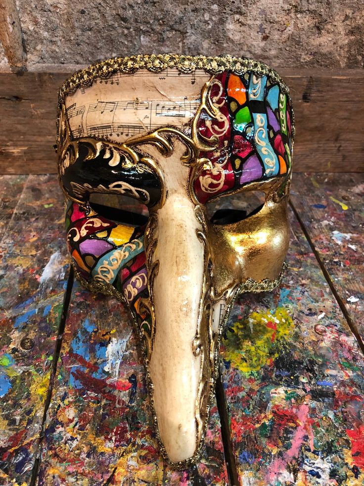 "Venetian Mask Pants,Trouser Mask,Venice mask,Carnival mask,Halloween mask,party mask,Pantalone mask,Venetian mask. Original Venetian mask Trousers, hand-painted embellished with gold leaf, decoration with stucco and acrylic colors. -Material/Resin Made in Italy hypoallergenic and non-toxic. -Size/25x20 Unisex -History of the mask/ \"Pantalone\" was born in Venice around the middle of the sixteenth century, it represents the typical old, hazy and lustful merchant: his own name indicates the male Traditional Masks And Prosthetics For Mardi Gras Carnival, Traditional Masks For Mardi Gras Carnival, Artistic Masks And Prosthetics For Mardi Gras Carnival, Gold Masks And Prosthetics For Carnival Festival, Hand Painted Masks And Prosthetics For Carnival, Venetian Masks For Mardi Gras Carnival, Gold Masquerade Mask For Mardi Gras Festival, Hand Painted Masks For Masquerade Carnival, Hand Painted Masks For Carnival Masquerade