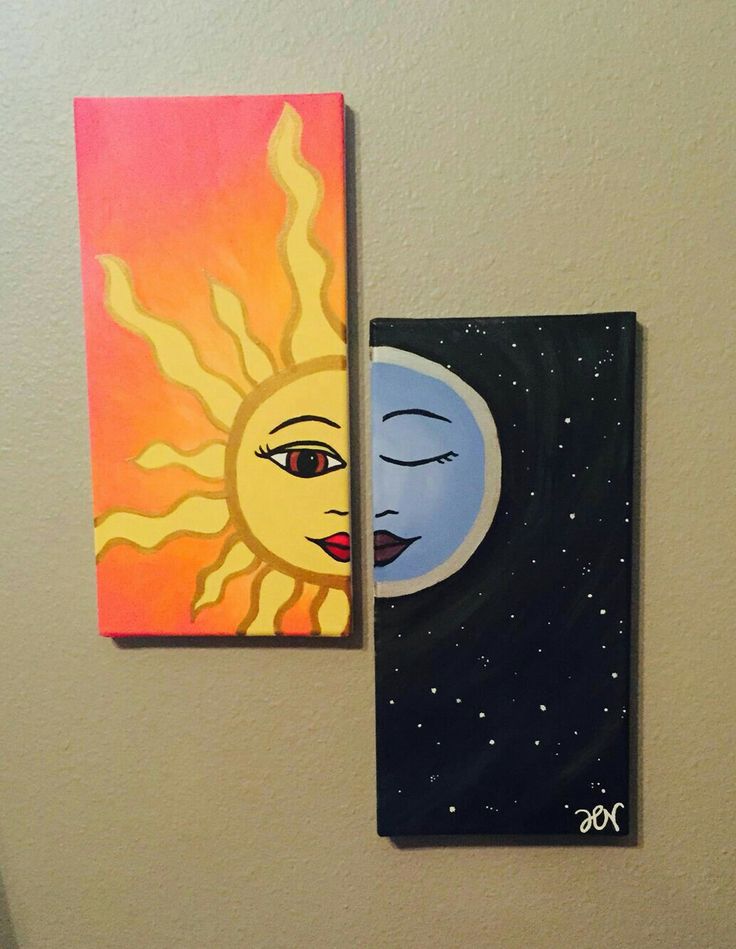 two paintings are hanging on the wall next to each other, one has a sun and moon painted on it