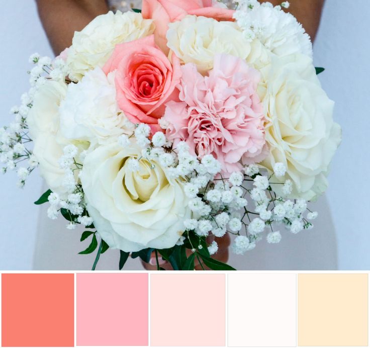 a bridal bouquet with pink and white flowers