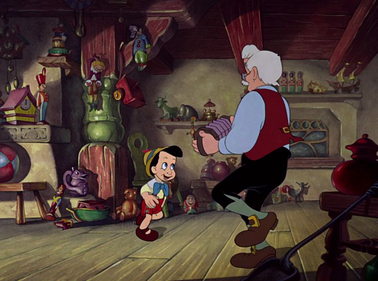 an old man is playing with a child in the animated version of disney's beauty and the beast