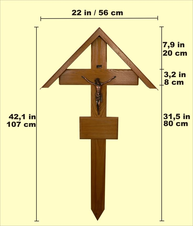 a wooden cross with a deer head hanging from it's side and measurements for the size