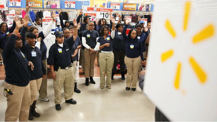 Corporate Uniform: The style of dress for Walmart employees exemplifies corporate uniform. These are the standards set by Walmart corporates. The unique color of the shirts and khaki makes them noticeable to the public. Walmart Uniform, Walmart Employee, Worker Uniform, Dress Code Policy, Alabama Clothes, Walmart Dresses, Business Dress Code, Job Outfits, Sisterhood Of The Traveling Pants