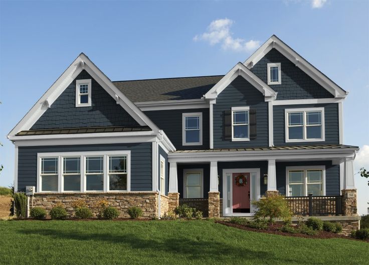 a large house with lots of windows on the front