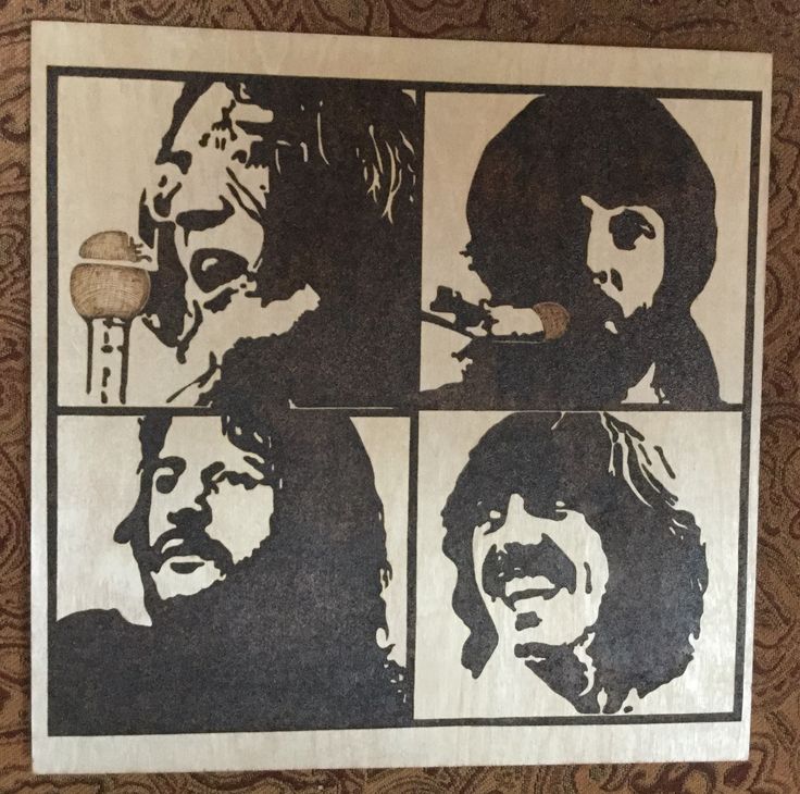 the beatles are depicted on this piece of paper in an art work that is being displayed