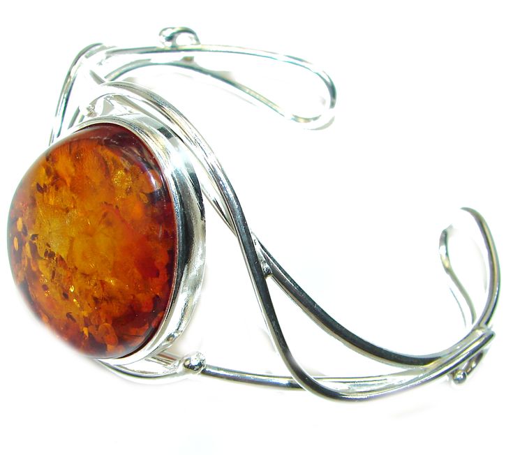 Handmade Unique 925 Sterling Silver bracelet with unique one of a kind Amber,  23.80 grams of marvelous handcrafted jewelry design. Only one piece availble ready to ship! It's unique worldwide bracelet - simply piece of art in world of fine jewelry. Vintage Design  Genuine Polish Amber .925 Sterling Silver handamde Bracelet / Cuff  BRACELET DETAILS: Weight: 23.80g; Material: Sterling Silver; Main stone: Amber; Width (widest section): L- 1 1/2, W - 1 1/8, T- 3/8 inch; Inner circumference: 6-9 inc Unique Adjustable Cuff Bracelet With Polished Finish, Handmade Fusion Style Sterling Silver Cuff Bracelet, Handmade Sterling Silver Fusion Cuff Bracelet, Unique Cabochon Cuff Bangle Bracelet, Unique Sterling Silver Bangle With Polished Finish, Hallmarked Adjustable Cuff Bracelet For Gift, Adjustable Hallmarked Cuff Bracelet As Gift, Adjustable Hallmarked Cuff Bracelet Gift, Oval Cuff Bracelet With Polished Finish As Gift