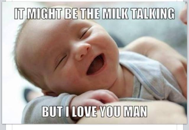 a baby laughing and holding it's mother with the caption that reads, i might be the milk talking but i love you man