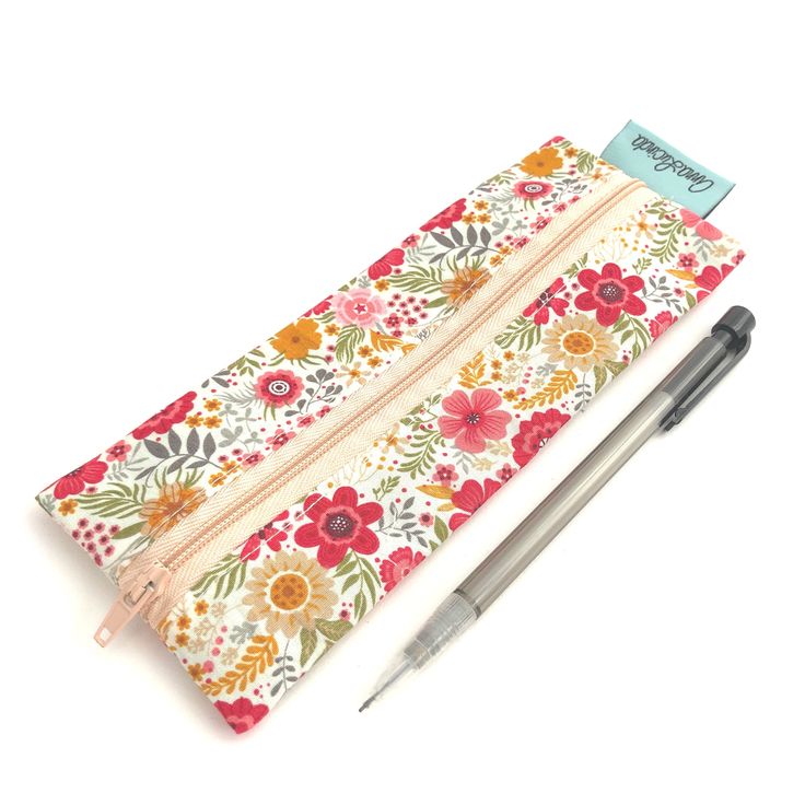 This zip pouch is perfect for storing your pens & pencils, make-up, or your everyday essentials in. It would make the perfect birthday or occasion gift or even a little treat for yourself!  Made from: - Outside - 100% Cotton fabric, Interfacing - Inside - 100% cotton fabric - Other - Nylon zip Dimensions: (Approximate) Length: 19cm Width - 7cm Care Instructions: Cool hand wash and air dry only All zip pouches are carefully and lovingly handmade by myself in my home studio. Pattern placement may Pencil-shaped Cosmetic Bag With Zipper For Back To School, Back To School Gift Pencil Case With Zipper Closure, Back To School Gift Pencil Case With Zipper, Zipper Cosmetic Bag For Back To School Gift, Rectangular Cosmetic Bag As Back To School Gift, Back To School Zipper Pouch Stationery, Rectangular Cosmetic Bag For Back To School Gift, Back To School Bag With Pen Holders, Back To School Gift Cosmetic Bag With Zipper Closure