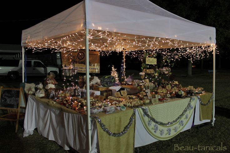 a tent with lights and decorations on it