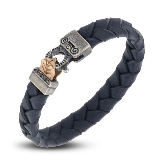 Dynamic woven blue leather wrap creates this distinct men's bracelet from the Lash Collection from Marco Dal Maso. Shimmering natural black diamond accents punctuate the bracelet to complete the look. Fashioned in blue leather and oxidized 18K rose gold-plated sterling silver, the 8-inch bracelet secures in place with an engraved trigger clasp. Black diamonds are treated to permanently create the intense black color. Luxury Leather Bracelet With Stainless Steel Clasp As Gift, Luxury Leather Bracelet Engraved, Elegant Blue Leather Bracelets, Luxury Leather Bracelet With Stainless Steel Clasp, Luxury Leather Strap Bracelets For Gift, Luxury Leather Strap Bracelet As Gift, Luxury Adjustable Engraved Leather Bracelet, Luxury Engraved Leather Bracelet, Luxury Leather Braided Bracelets For Gift