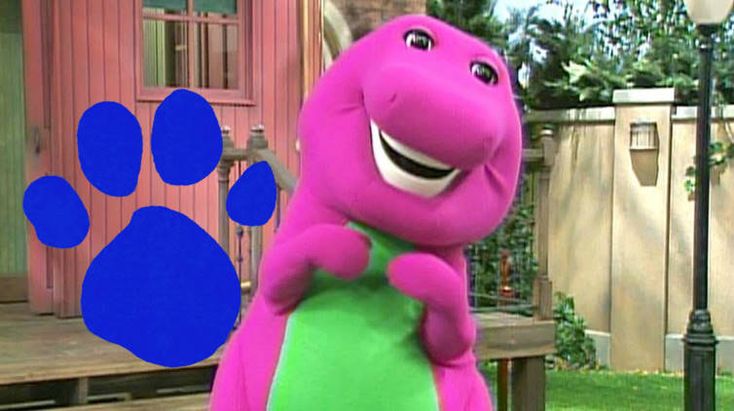 the pink dinosaur is standing in front of a house with blue paw prints ...