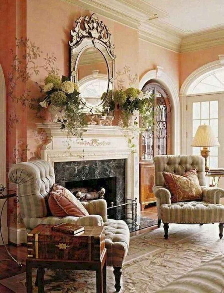 a living room filled with furniture and a fire place in the middle of a room