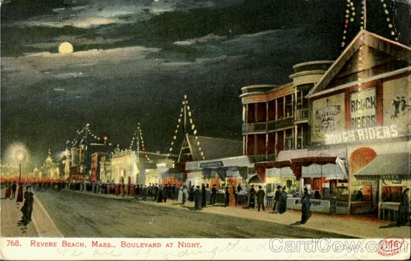 an old postcard shows people walking down the street at night