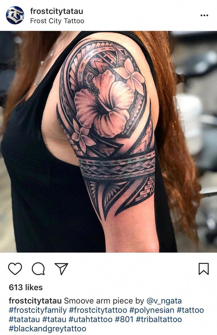 a woman with a flower tattoo on her arm