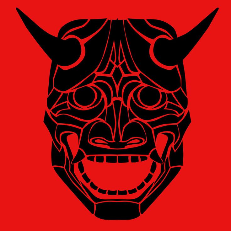 a red and black mask with horns on it's face, against a red background