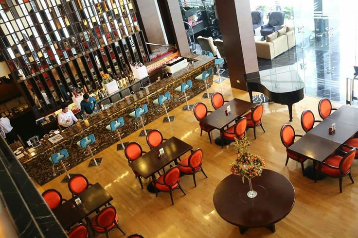 an overhead view of a restaurant with many tables and chairs in the middle of it