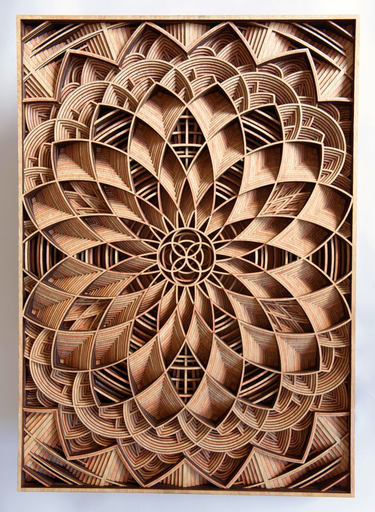 an intricate wooden design on the wall