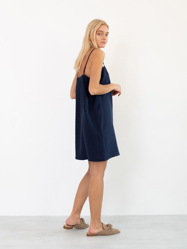 "VIOLET is an an effortless throw-on slip dress that falls just above knees. DETAILS - Square neckline - Spaghetti straps - Elastic back - Oeko-Tex certified 100% local washed midweight linen - Cut and sewn to order just for you in our studio COLOR - Navy Blue, you can also choose other colors above - Fabric samples are available here https://www.etsy.com/listing/586569696/linen-fabric-samples SIZING & FIT - Fits true to size - Length (shoulder to hem) is approximately 89 cm / 35 inches - Me Casual Spaghetti Strap Loungewear Dress, Slip Dress Summer, Linen Slip Dress, Wide Leg Linen Trousers, Studio Color, Wedding Wraps, Linen Trousers, Oct 11, Friend Wedding