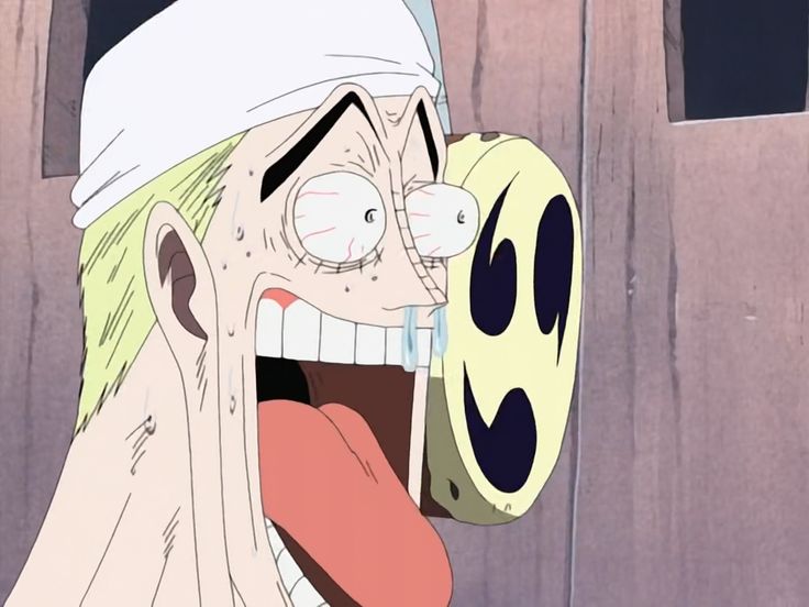 an anime character with his mouth open and tongue out, holding a mask in front of him