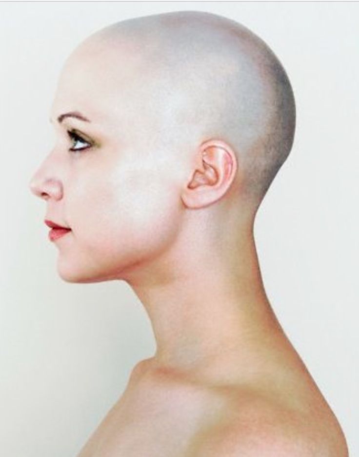 an image of a woman with shaved hair