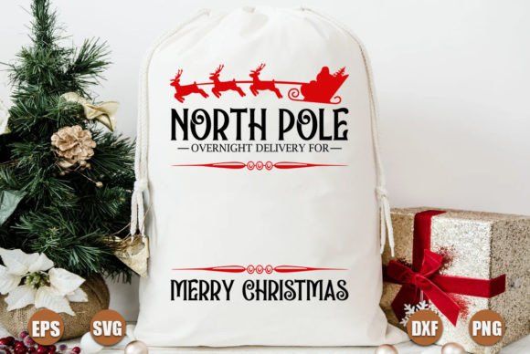 a white bag with santa's sleigh on it next to christmas presents