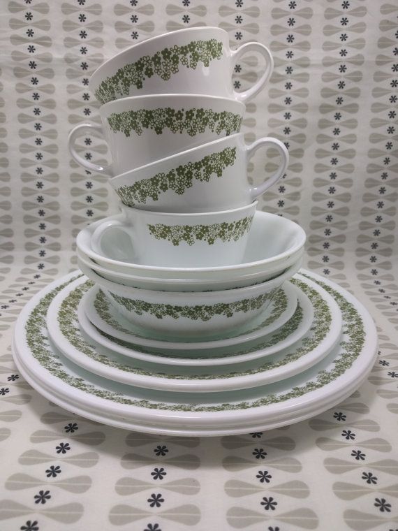 a stack of cups and saucers sitting on top of each other