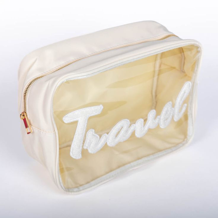 Discover practicality and charm with our Sewn-On Clear Nylon Bags, perfect for organizing with a touch of style. Designed from durable materials, these bags feature a clear nylon construction, allowing easy visibility of contents while offering protection. Ideal for storing and carrying various items, they are enhanced with a soft terry cloth accent that adds a cozy and appealing texture. Whether used for travel essentials, crafting supplies, or everyday necessities, these bags are versatile and Clear Cosmetic Bag With Strap For Travel, On-the-go Nylon Cosmetic Bag With Removable Pouch, White Travel Bag With Clear Strap, Clear Travel Cosmetic Bag With Removable Pouch, Clear Cosmetic Bag With Removable Pouch For Travel, Nylon Travel Bag With Clear Strap, Nylon Travel Pouch Bag, Travel Nylon Pouch Bag, Travel Nylon Bag With Clear Strap