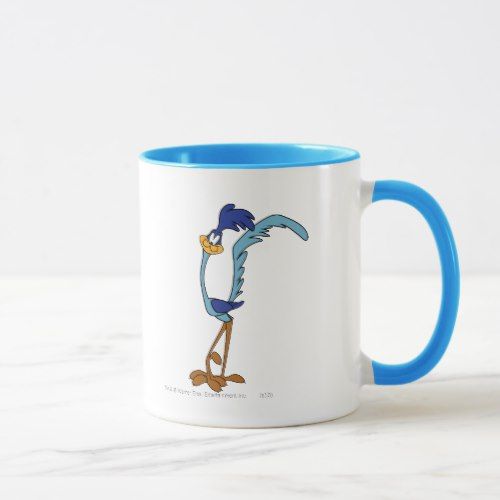 a blue and white coffee mug with an image of a cartoon character on the side