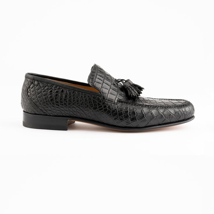 Premium crocodile leather, a classic design, color and comfort all packed into one. The perfect pair of dress shoes to compliment any attire for every special occasion. Luxury Semi-formal Tassel Loafers With Rubber Sole, Luxury Semi-formal Tassel Loafers, Luxury Slip-on Dress Shoes For Semi-formal Occasions, Elegant Black Dress Shoes With Crocodile Pattern, Elegant Semi-formal Dress Shoes With Crocodile Pattern, Luxury Moc Toe Tassel Loafers For Galas, Luxury Moc Toe Tassel Loafers For Business, Luxury Goodyear Welted Loafers For Galas, Luxury Goodyear Welted Tassel Loafers For Business