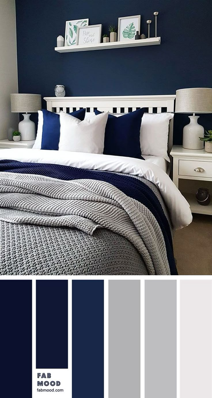 a bedroom with blue walls and white bedding in the center, along with two nightstands