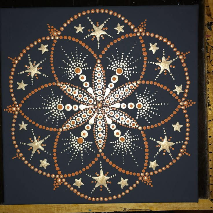 a painting with stars and circles on it