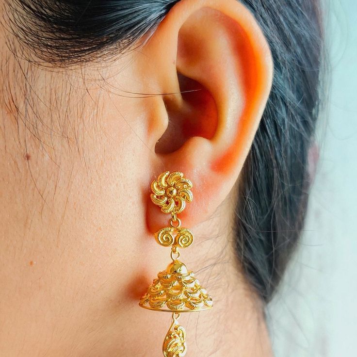 This is a beautiful 22k Real Gold pair of jhumka Earrings .  This is the perfect gift for mom, wife, fiancée, girlfriend, valentine, daughter, family or friend. It is a special gift for mother's day, valentine's day, wedding, anniversary, birthday, Christmas, Easter, New Year's and any holiday. 1. Material Details ✫ Gold : 22K (Real Gold) ✫ Gold Color Options: Yellow Gold ✰ Shape: floral ✰ Color: Yellow ✰ Weight: 9.301 grams approx. Terms & Conditions If there is any change. We request buyer to please inform us before item is shipped. After shipping we cannot accept any changes. Luxury Yellow Gold Jhumkas For Festivals, Luxury Yellow Gold Jhumkas As Gift, 22k Gold Jhumkas For Wedding And Navratri, 22k Gold Jhumkas With Latkans For Wedding, Wedding 22k Gold Jhumkas With Latkans, 22k Gold Jhumkas For Wedding, 22k Gold Jhumkas For Wedding And Diwali, 22k Gold Chandbali Bridal Earrings With Latkans, 22k Gold Jhumkas With Latkans For Navratri