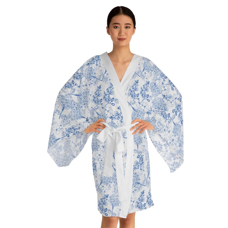 Whether it's lounging at home or making a stylish appearance, these kimono-style robes are as beautiful as they are cozy. With a figure-flattering shape, this chic mid-length robe features the signature flowing bell sleeves and a belt, making it an absolute delight for Japanese style enthusiasts. Each kimono is 100% made with Polyester for that smooth & silky feel. .: 100% polyester .: Light fabric (4.72 oz/yd²(160g/m .: Figure-flattering and versatile shape .: Smooth feel . Grand Millennial Blue | Blue and White Floral | Classic | Southern Decor | Floral Blue | Classic Southern | GM Designs  traditionally classic Grandmillennial | Granny Chic |Ornate  | Landscape Art Spring Cotton Kimono For Lounging, Cotton Kimono For Spring Lounging, Relaxed Fit Robe For Home Use In Spring, Spring Kimono With Relaxed Fit, Robe With Relaxed Fit And Kimono Sleeves For Daywear, Blue Kimono With Kimono Sleeves For Daywear, Blue Kimono For Spring Daywear, Blue Kimono For Daywear In Spring, White Kimono With Kimono Sleeves For Daywear