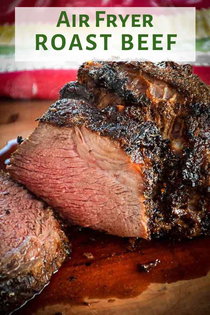 air fryer roast beef on a cutting board with text overlay that says air fryer roast beef