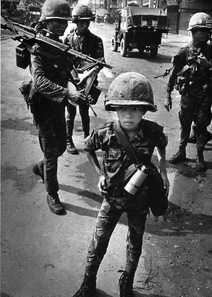 Philip Jones Griffith:Ten year old South Vietnamese soldier. South Vietnam, 1968.  Called a little tiger for killing two Vietcong women - his mother and teacher, it was rumored. Gerda Taro, Vietnam Vets, South Vietnam, Fukushima, Nagasaki, Magnum Photos, Accra, Vietnam Veterans, Photo Vintage