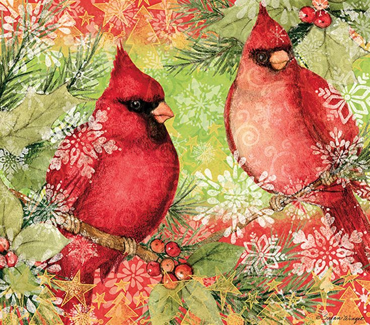 two red birds sitting on top of a green and red christmas tree covered in snowflakes