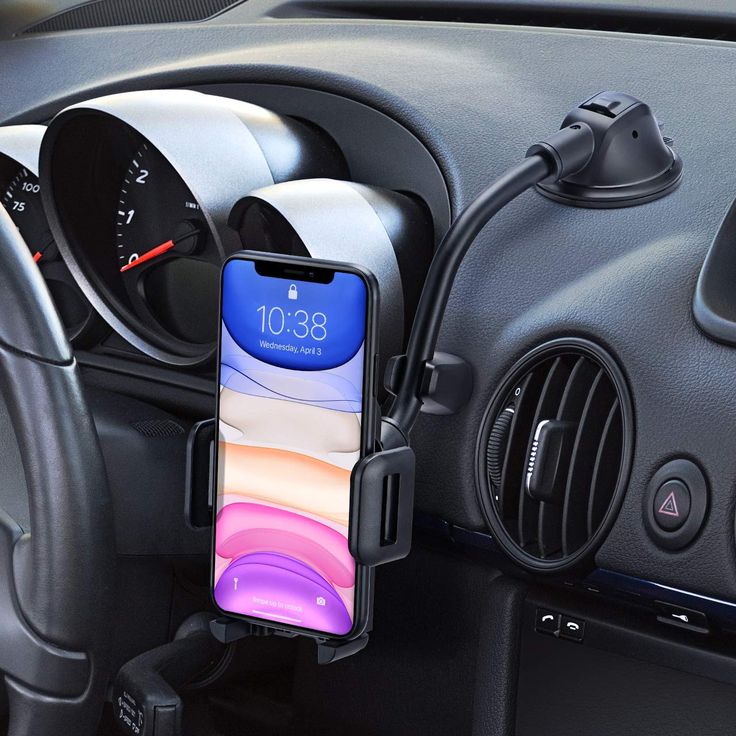 an iphone is hooked up to a car charger in the passenger's compartment