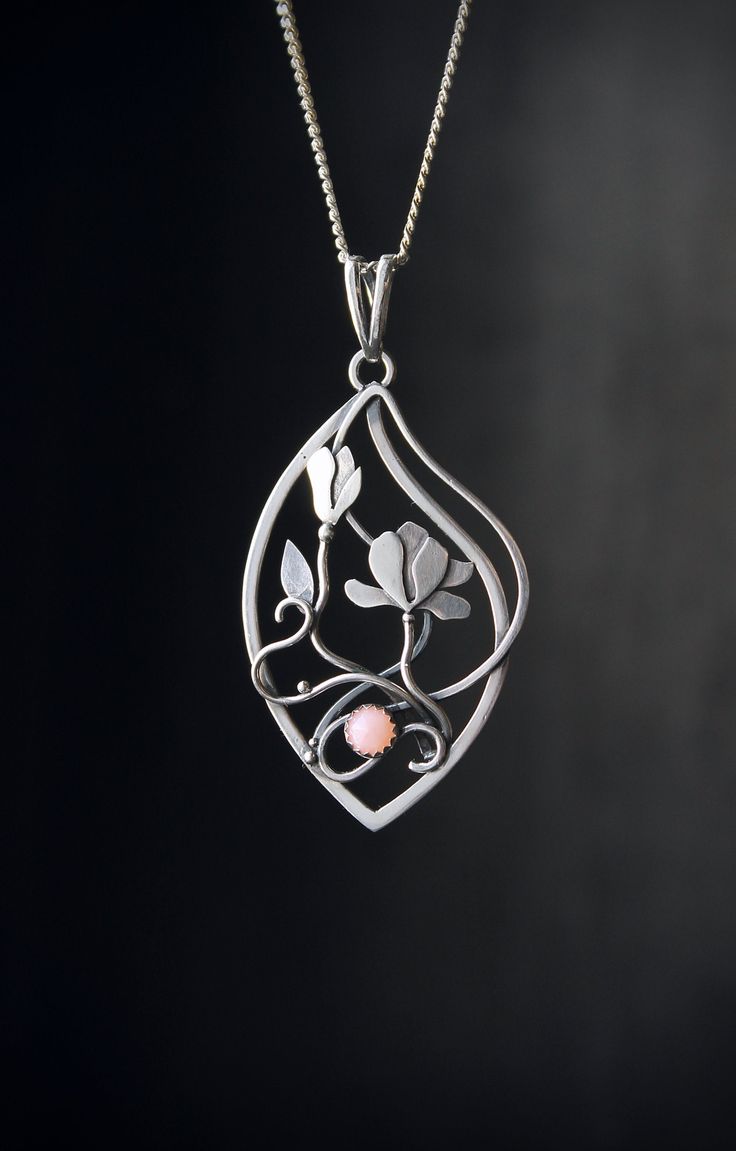 ITEM DESCRIPTION: The size H 5 cm x W 3 cm (1 3/4 x 1 inch). Weight - 4g. You can buy it with the chain or without. I made this blossom magnolia necklace of sterling silver and natural pink opal. It looks so elegant and sincerely! The gemstone has a light pink color - - the same as magnolia petals. The floral necklace is lightweight and comfortable This botanical pendant will be a great addition to your jewelry collection or a great gift for someone you love. Ooak jewelry made by eco-friendly ma Nature-inspired Jewelry With Flower Charm, Handmade Sterling Silver Petal Jewelry, Elegant Flower-shaped Large Pendant Jewelry, Elegant Flower Shaped Large Pendant Jewelry, Elegant Floral Large Pendant Jewelry, Wedding Jewelry With Large Flower Pendant, Unique Flower-shaped Jewelry With Flower Charm, Art Nouveau Sterling Silver Pendant, Elegant Flower-shaped Jewelry With Charms