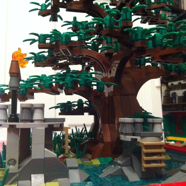 a lego tree with lots of green leaves