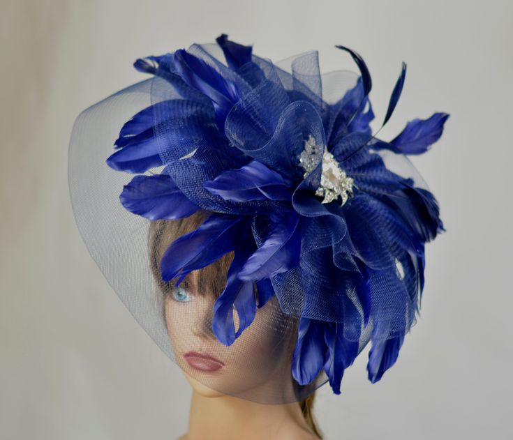 This headband is perfect for horse racing events, church, the Kentucky derby, weddings, garden tea parties and charity events. Please visit my other shop https://www.etsy.com/shop/BridalWorldAccessory?ref=hdr_shop_menu Thank you for shopping at my shop Have a great day Elegant Blue Headband For Kentucky Derby, Blue Headpiece For Kentucky Derby, Blue Mini Hats As Summer Gifts, Blue Mini Hats As Gifts For Summer, Blue Headband Hat For Races, Elegant Blue Headband For Gift, Elegant Blue Headband As Gift, Elegant Blue Headband Gift, Royal Blue Mini Hats For Royal Ascot Races