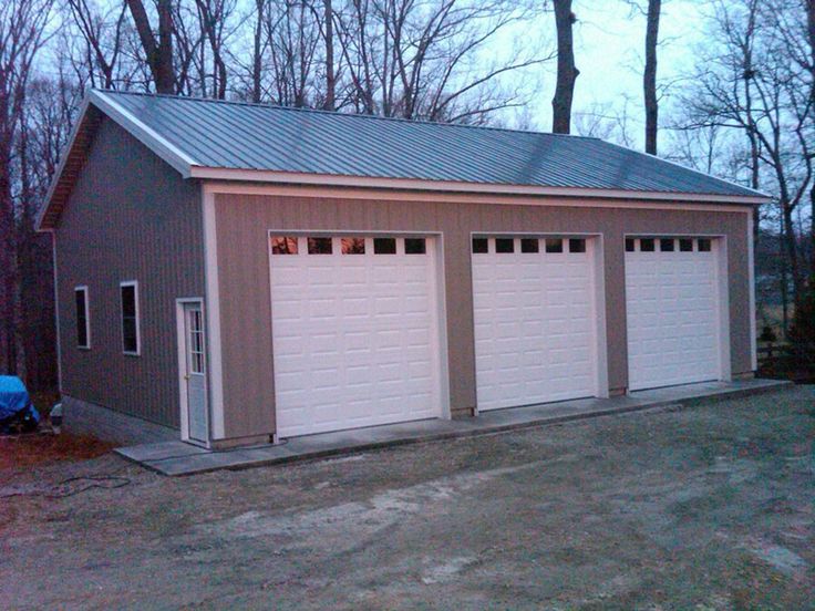 two garages with one car attached to the side and another on the other side