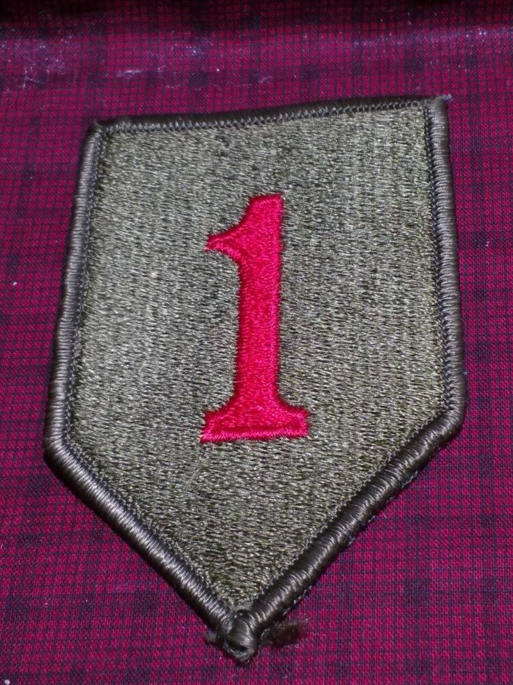 the number one patch is pink and grey