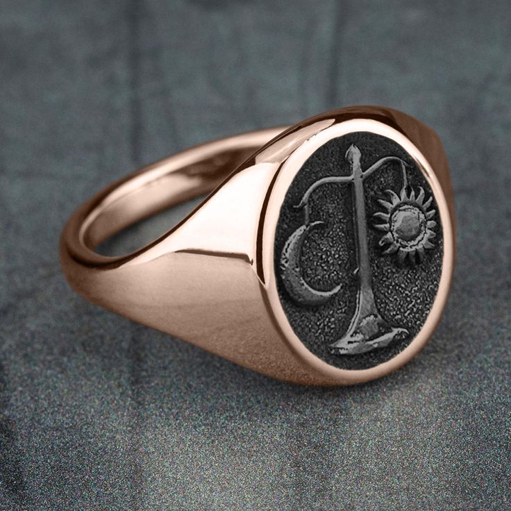 Libra - The Scales: You are known for your good taste, elegance, and charm. Peace and tranquility are important to you. Your personality brings a fair balance and different perspective to those around you, making others feel comfortable in your presence. 16mm oval signet ring 10K Rose Gold with Tantalum Grey center Available in 2 fits: Luxe and Basic Available in 2 finishes: Satin and Polish Rose Gold Luxury Signet Ring As Gift, Luxury Rose Gold Signet Ring For Gift, Luxury Oval Rose Gold Signet Ring, Luxury Rose Gold Oval Signet Ring, Elegant Oval Rose Gold Signet Ring, Elegant Rose Gold Oval Signet Ring, Luxury 14k Stamped Rose Gold Signet Ring, Luxury Rose Gold Signet Ring For Anniversary, Elegant Rose Gold Signet Ring With Polished Finish