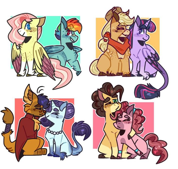 four different colored ponies sitting next to each other