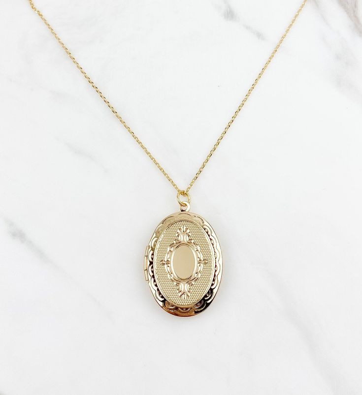 "Large Locket necklace, oval Locket necklace, gifts for her, birthday gift, vintage look locket, gold plated locket necklace, jewelry, gifts *Large Oval shaped locket suspended on dainty gold plated cable chain *Oval locket pendant is approx 1.25\", inside size is approx 7/8\" *Chose your perfect length SHIPPING: *Free domestic shipping on all orders PACKAGING: *All pieces come beautifully packaged, perfect for gift giving. Find more to ❤️ here: http://etsy.com/shop/thejewelrystandard" Elegant 14k Gold Oval Locket Necklace, Formal Gold Oval Locket Necklace, Dainty Gold Oval Locket Necklace, Elegant Gold Oval Locket Necklace, Timeless Oval Locket Necklace, Orders Packaging, Oval Locket Necklace, Wattpad Ideas, Locket Necklaces